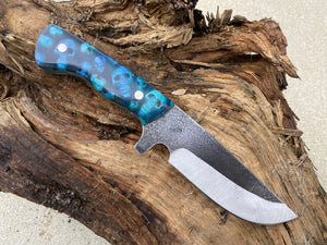 High carbon knife with Cast resin Skull knife scales or handles. By Bergknifemaking.com